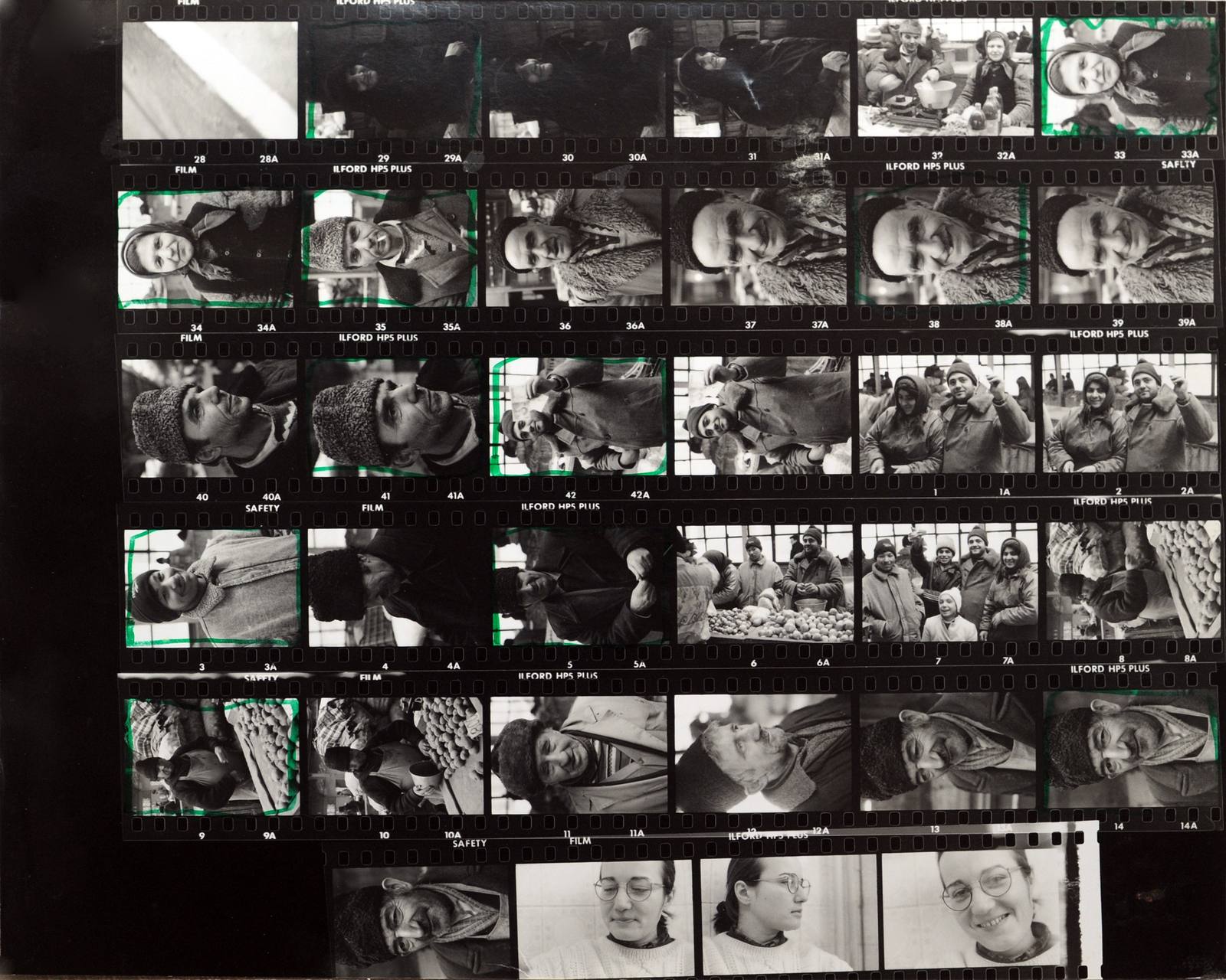 A black and white contact sheet print of photographic negatives